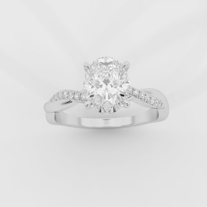 Twist Shank Oval Diamond Ring in White Gold