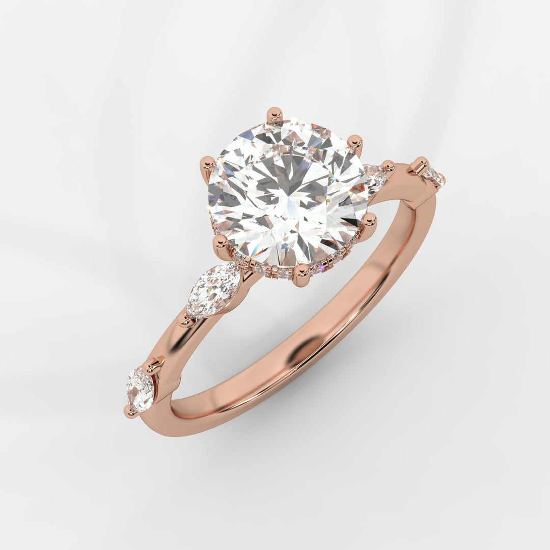 A side view of a rose gold engagement ring showcasing the elevated round lab-grown diamond and hidden halo design with marquise-cut lab-grown diamonds on the band.