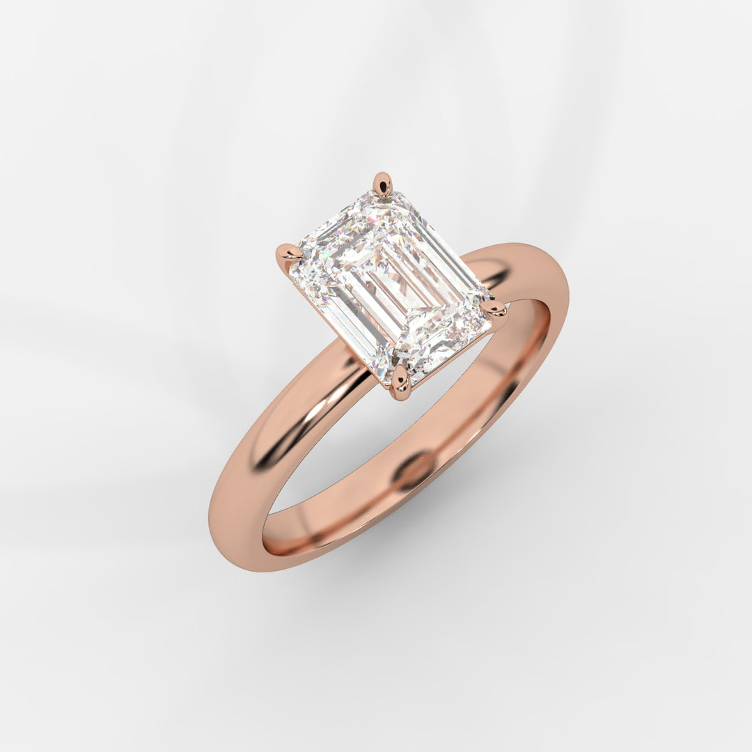 Solitaire Emerald Ring in Rose Gold