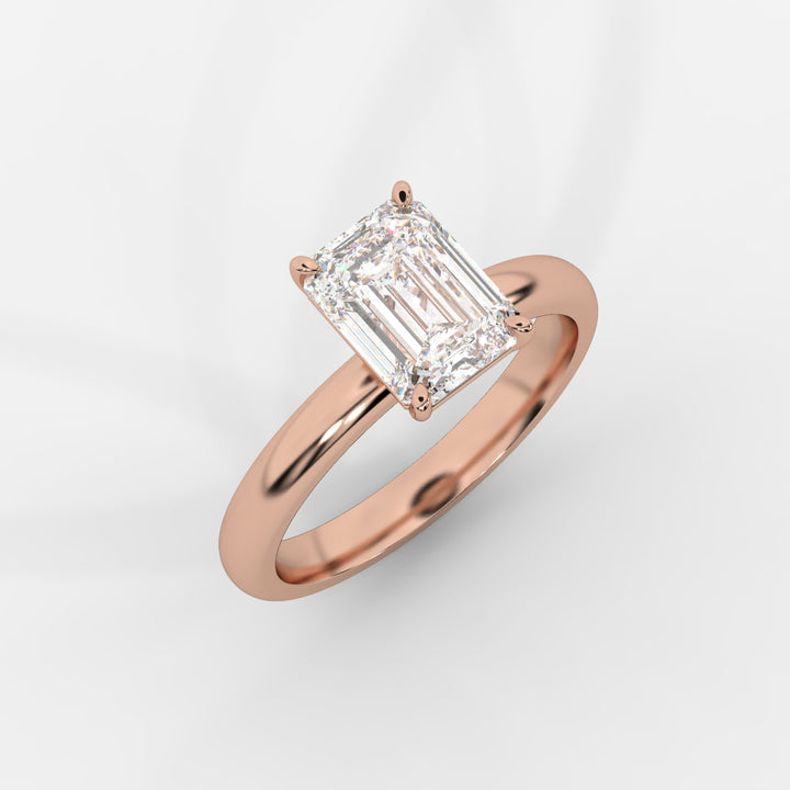 Solitaire Emerald Ring in Rose Gold