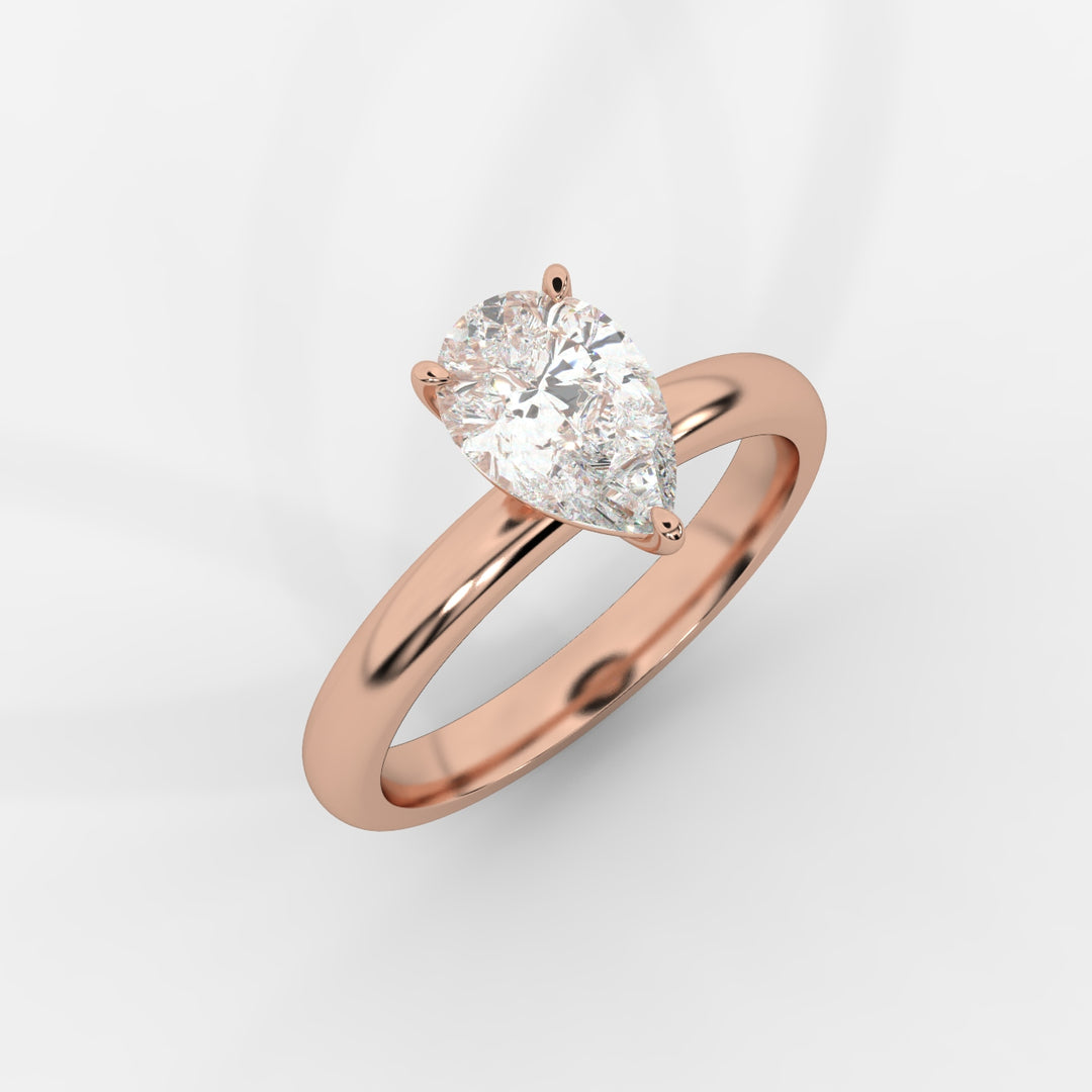 Solitaire Pear Ring in Rose Gold