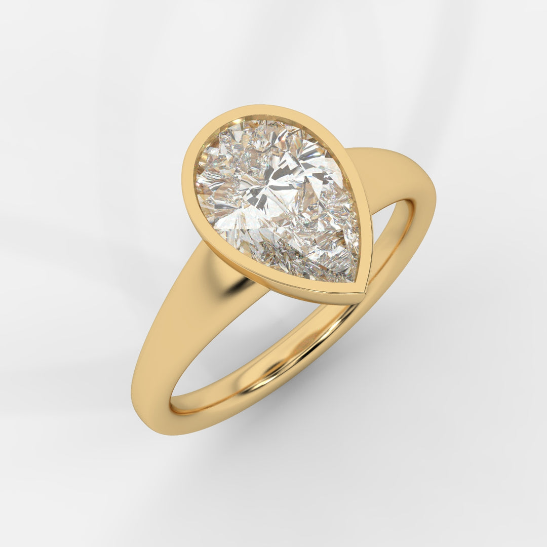 Pear cut in Bezel with Bold Band Ring