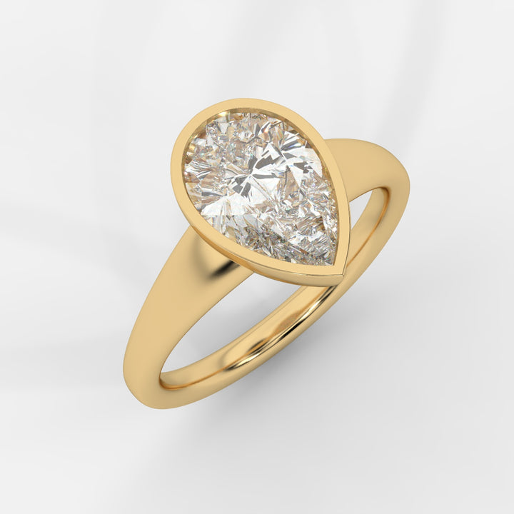Pear cut in Bezel with Bold Band Ring