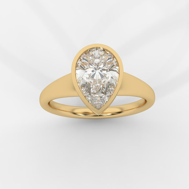 Pear cut in Bezel with Bold Band Ring